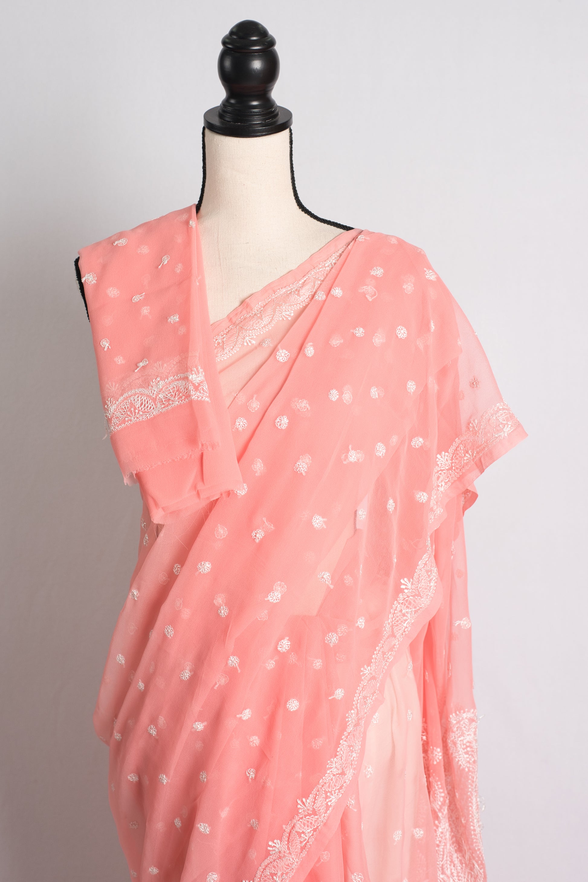 Hand Embroidery Chikankari on Faux Chiffon Saree in Peach and White.