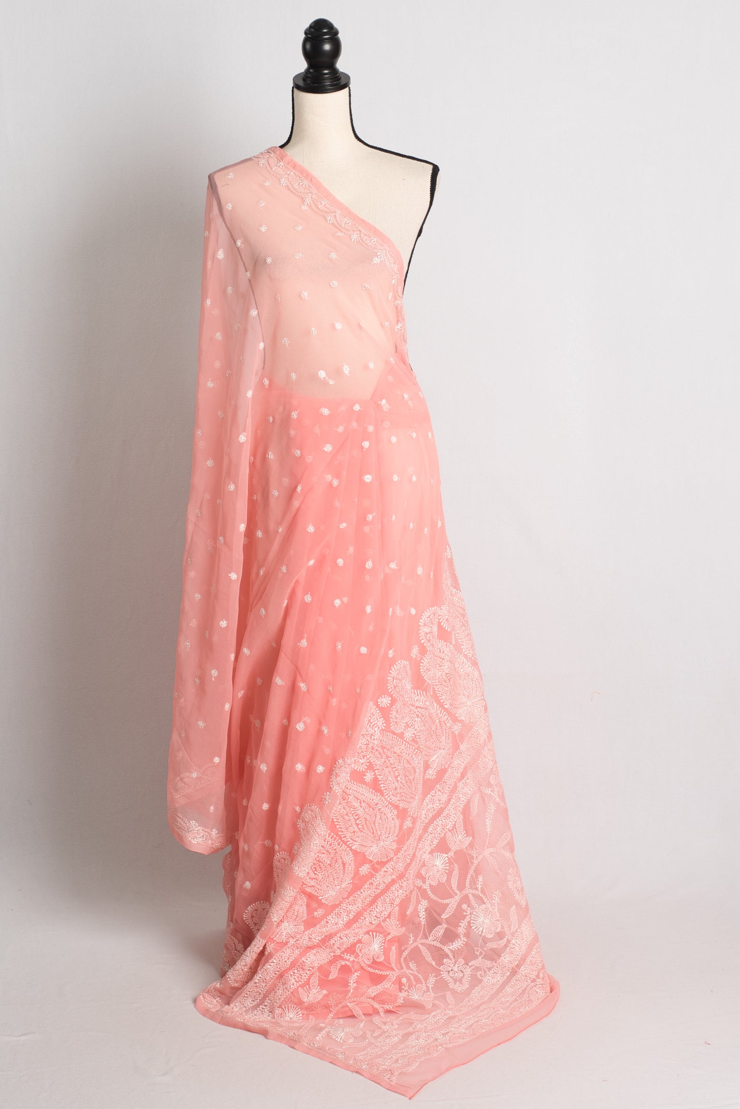 Hand Embroidery Chikankari on Faux Chiffon Saree in Peach and White.