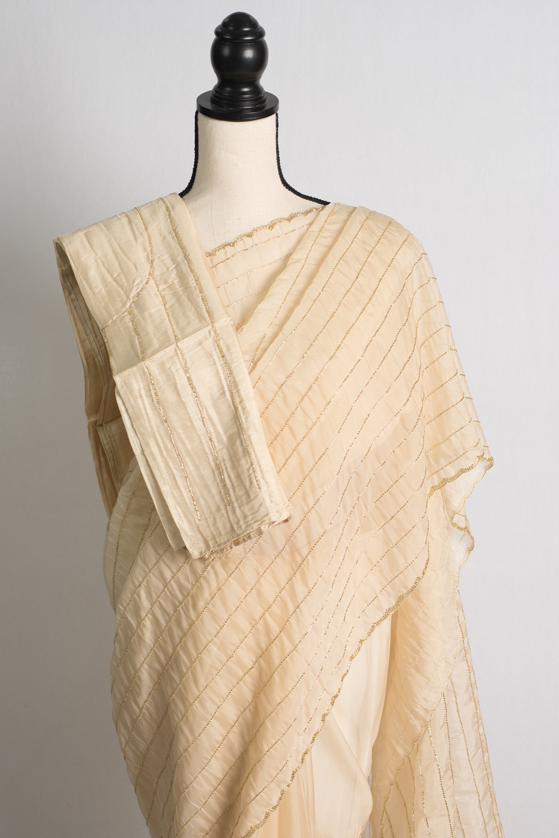 Cream and Gold Organza Cocktail Saree.