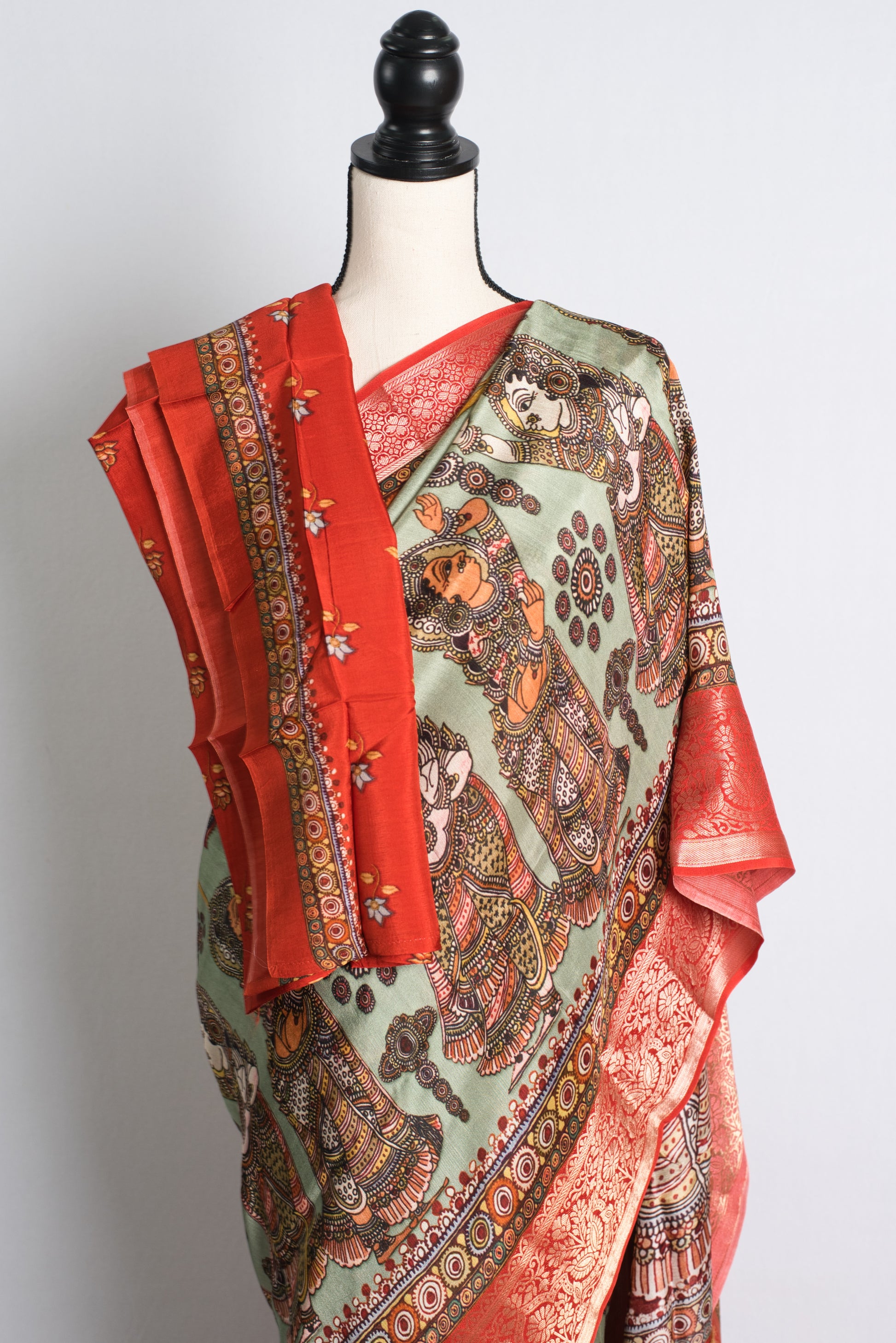 Blended Silk Printed Kalamkari Saree in Sea Green and Red.