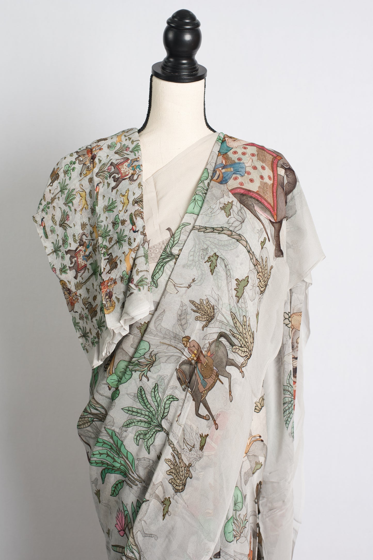 Grey Georgette Saree with Unique Prints Depicting a Hunting Scene.