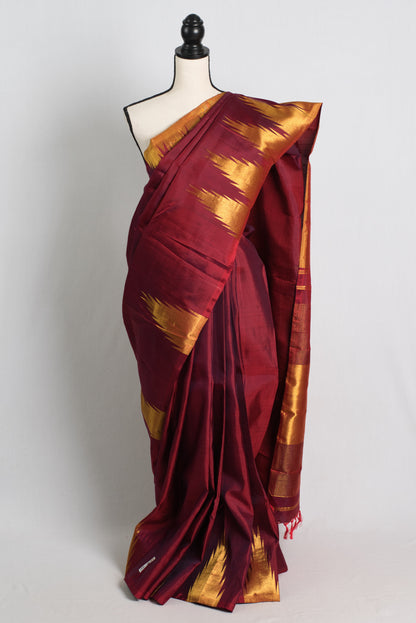 Temple Border Maroon Kanjivaram Silk Saree with Golden Zari.