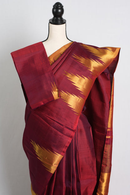 Temple Border Maroon Kanjivaram Silk Saree with Golden Zari.