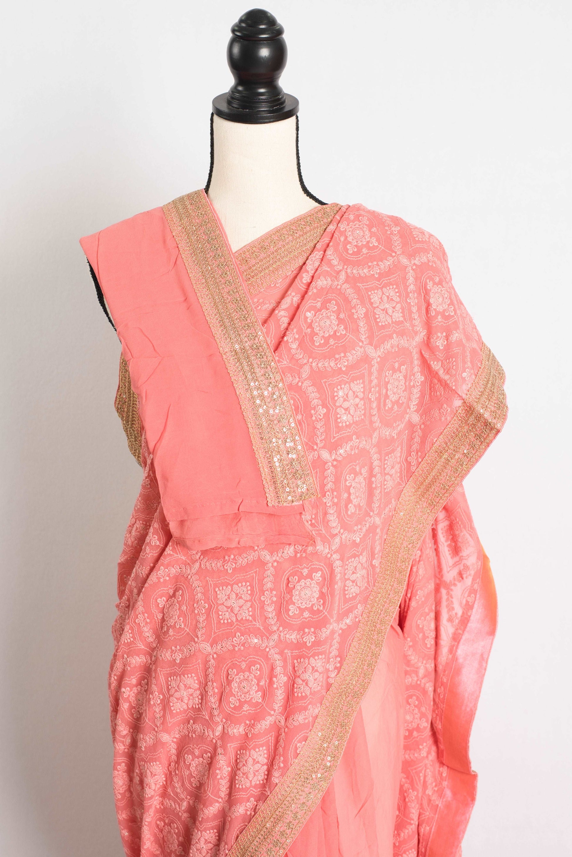 Partywear Georgette Chikankari Saree in Peach.