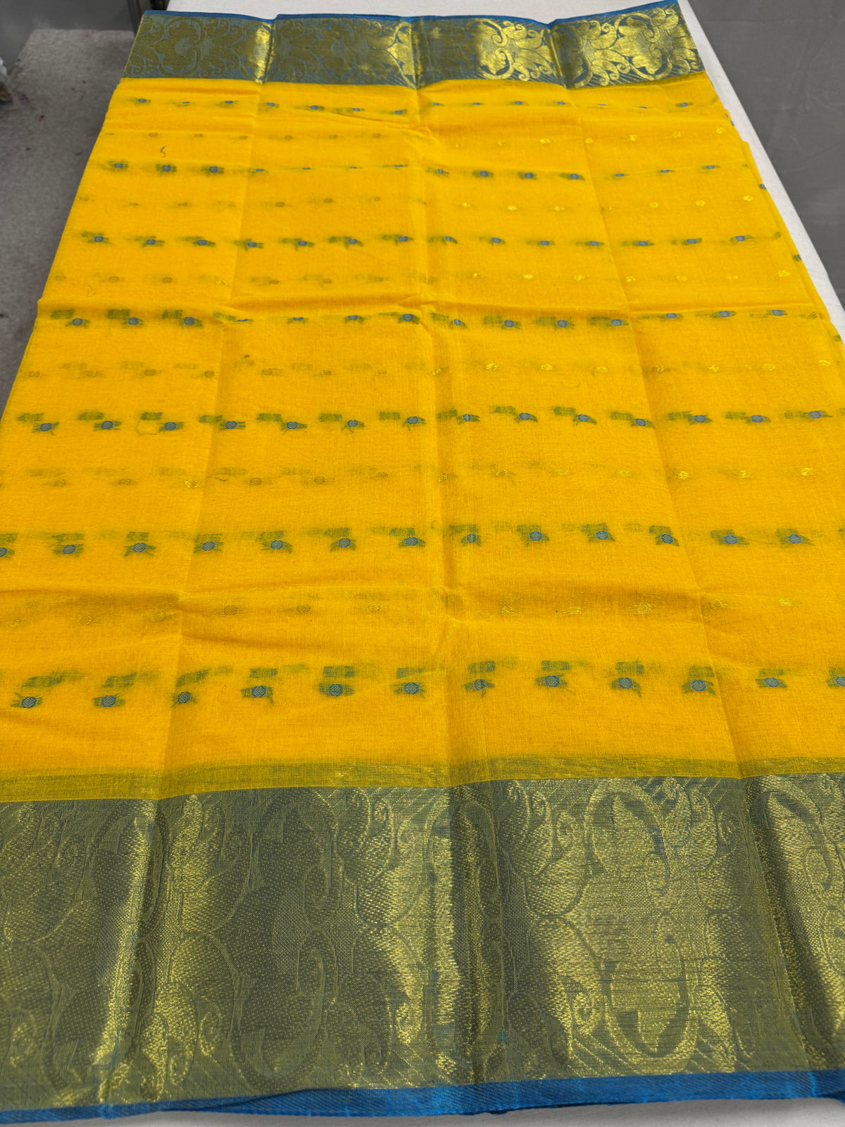 Yellow and Blue Tant saree — detail view