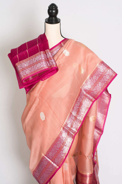 Bidisha : Silk Mark Certified Peach Organza Banarasi Saree with Silver Zari