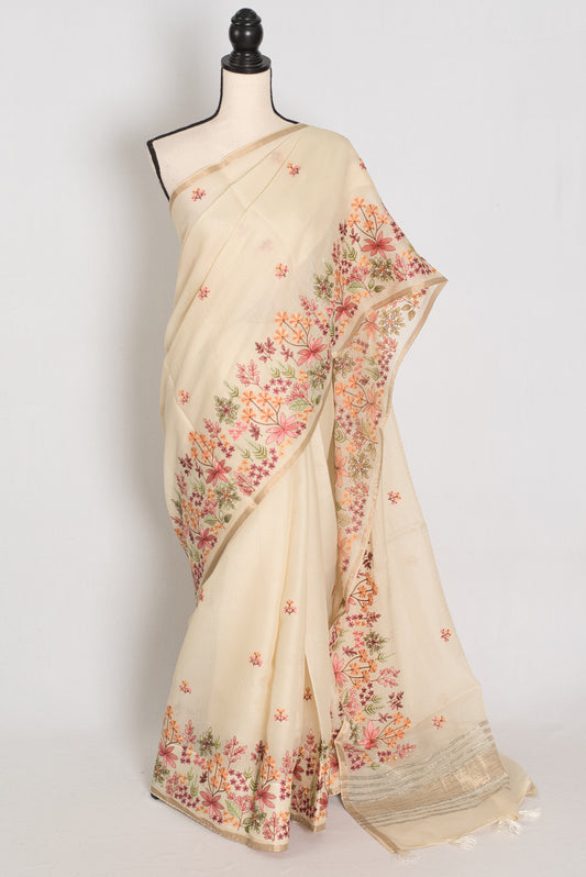Beige saree with floral patterns on a mannequin against a white background