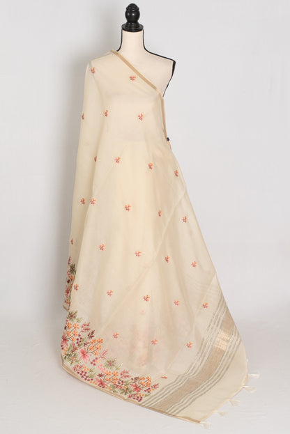 Beige saree with floral patterns on a mannequin against a white background