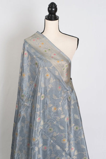 Damini : Semi Crepe Silk Jaal Banarasi Saree in Grey and Muted Gold - Saree Mandi