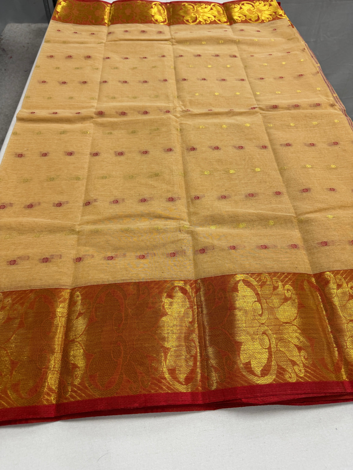 Beige and Red Tant saree — front view