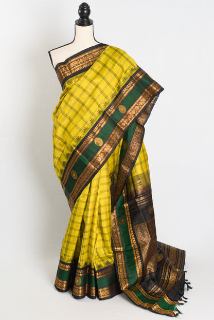 Brinda : Exclusive Checks Kanji Gadwal Silk Saree in Pineapple Green and Black image 0