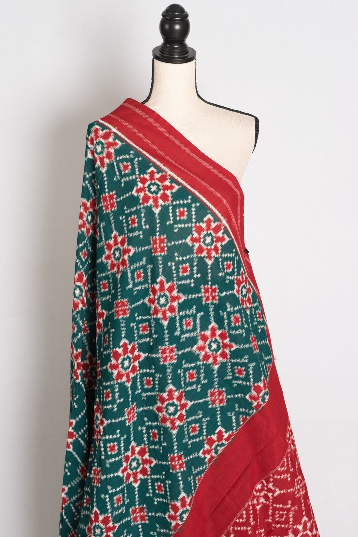 Bottle Green Ikat saree — border detail