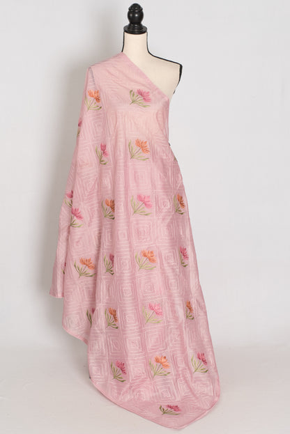 Pink floral dress on a mannequin against a white background