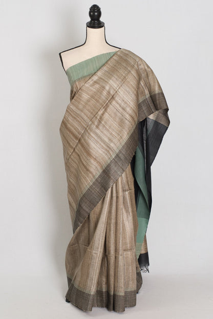 Minakshi: Natural Tan Ketiya Tussar Silk Saree with Ganga Jamuna Border - Saree Mandi
