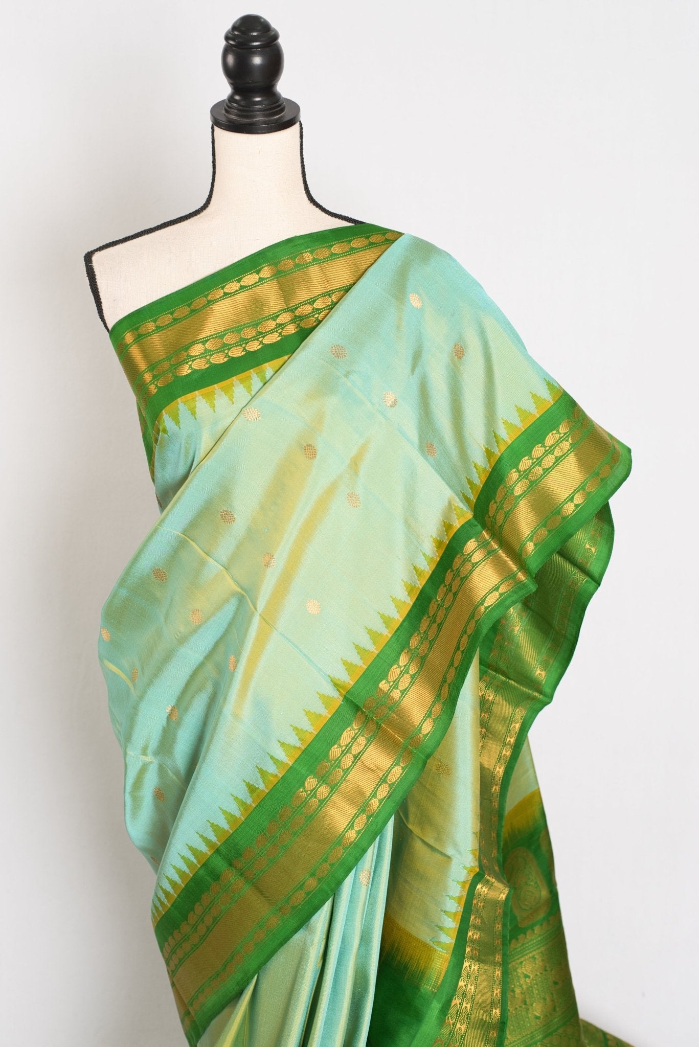 Mitra: Dual Tone Green Handwoven Gadwal Silk Saree with Contrast Border - Saree Mandi