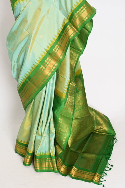 Mitra: Dual Tone Green Handwoven Gadwal Silk Saree with Contrast Border - Saree Mandi