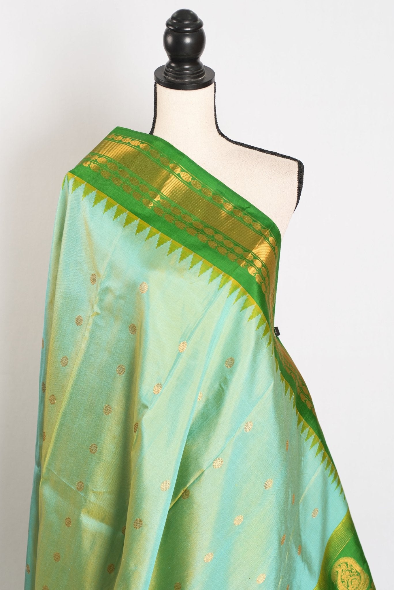 Mitra: Dual Tone Green Handwoven Gadwal Silk Saree with Contrast Border - Saree Mandi