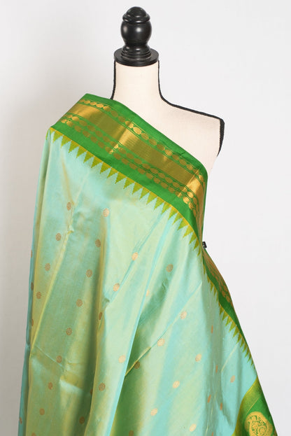 Mitra: Dual Tone Green Handwoven Gadwal Silk Saree with Contrast Border - Saree Mandi