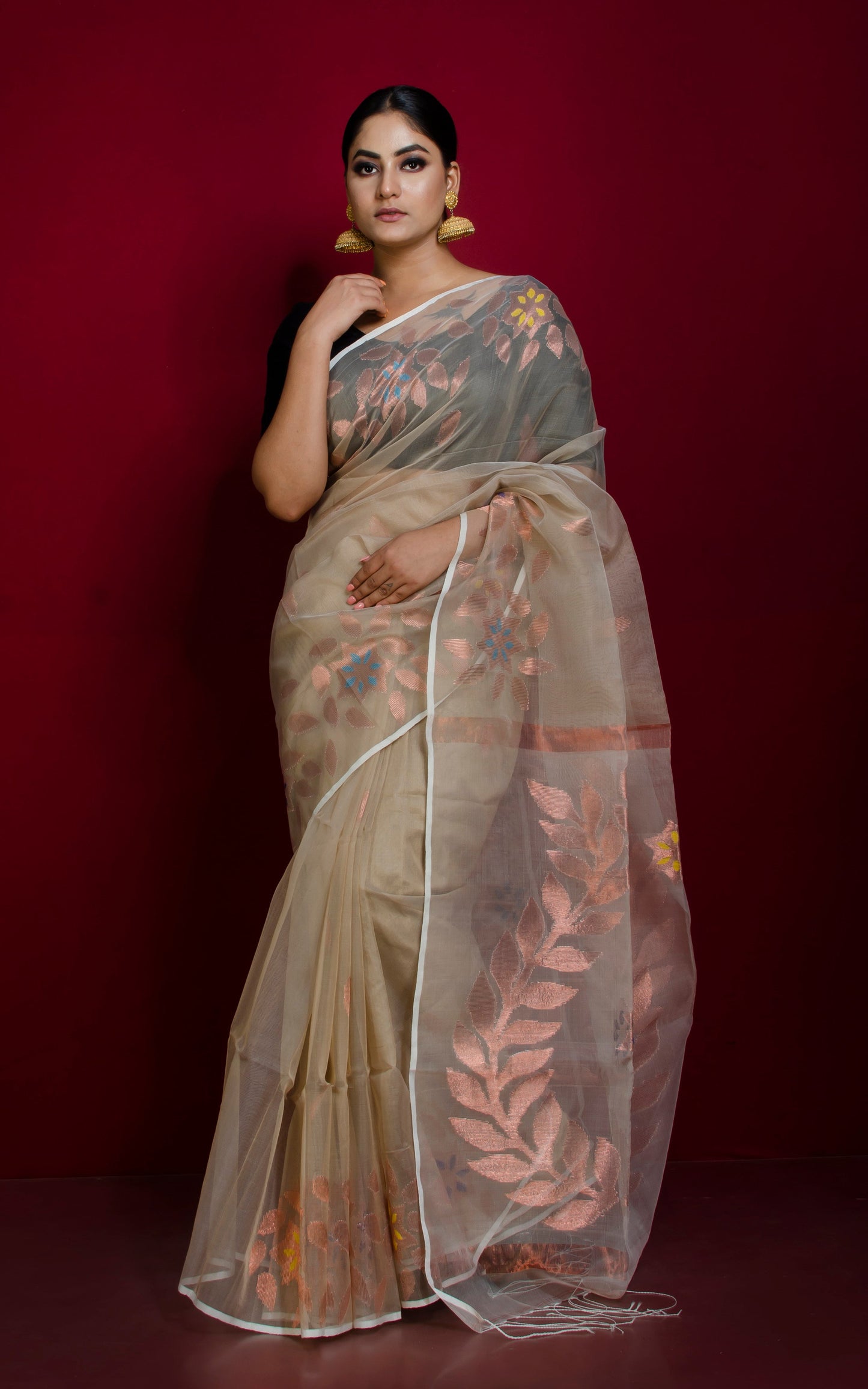 Soft Muslin Jamdani Saree in Beige, Gold and Multicolored Meenakari Work.