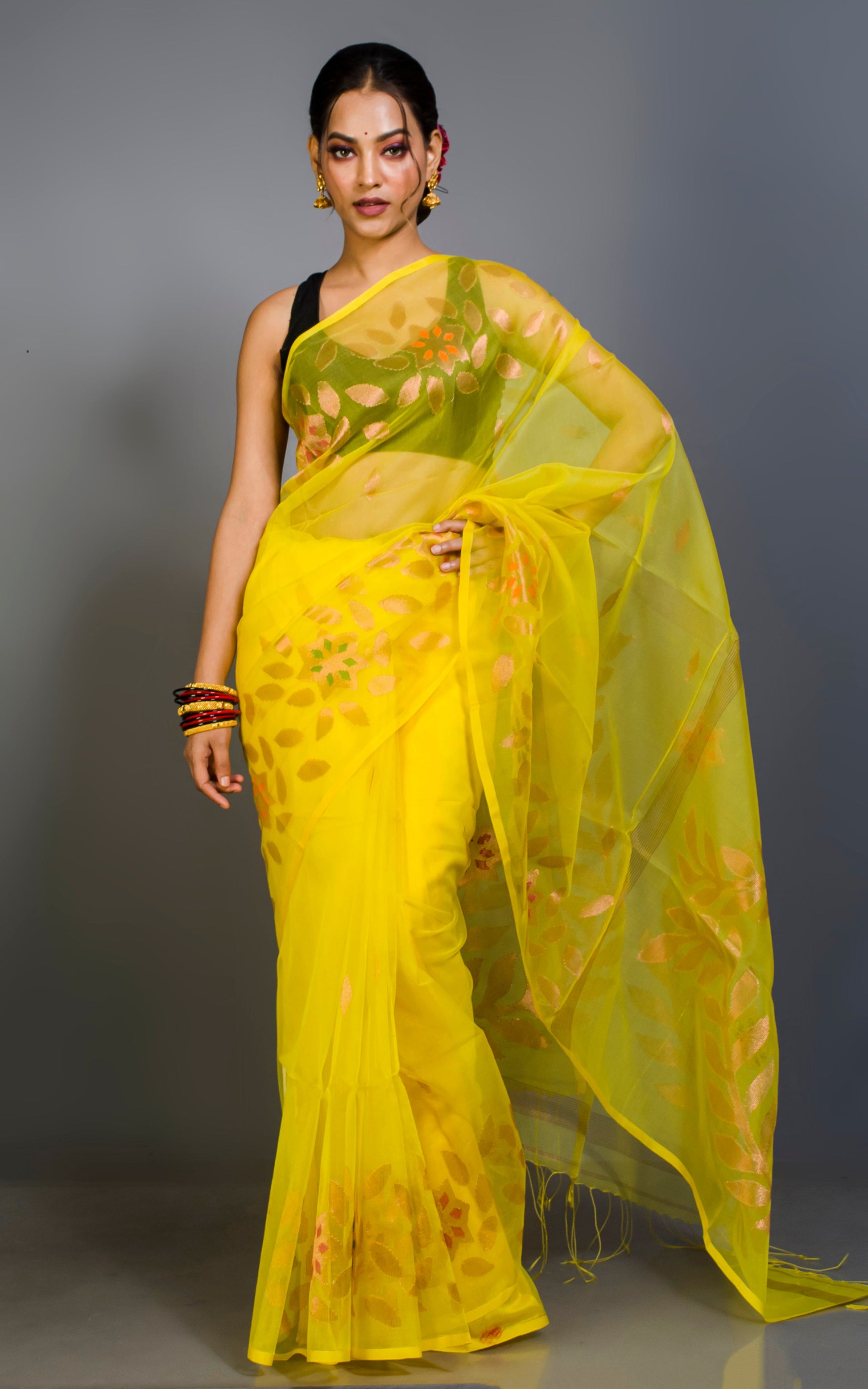 Soft Muslin Jamdani Saree in Cadmium Yellow, Copper and Multicolored Meenakari Work.