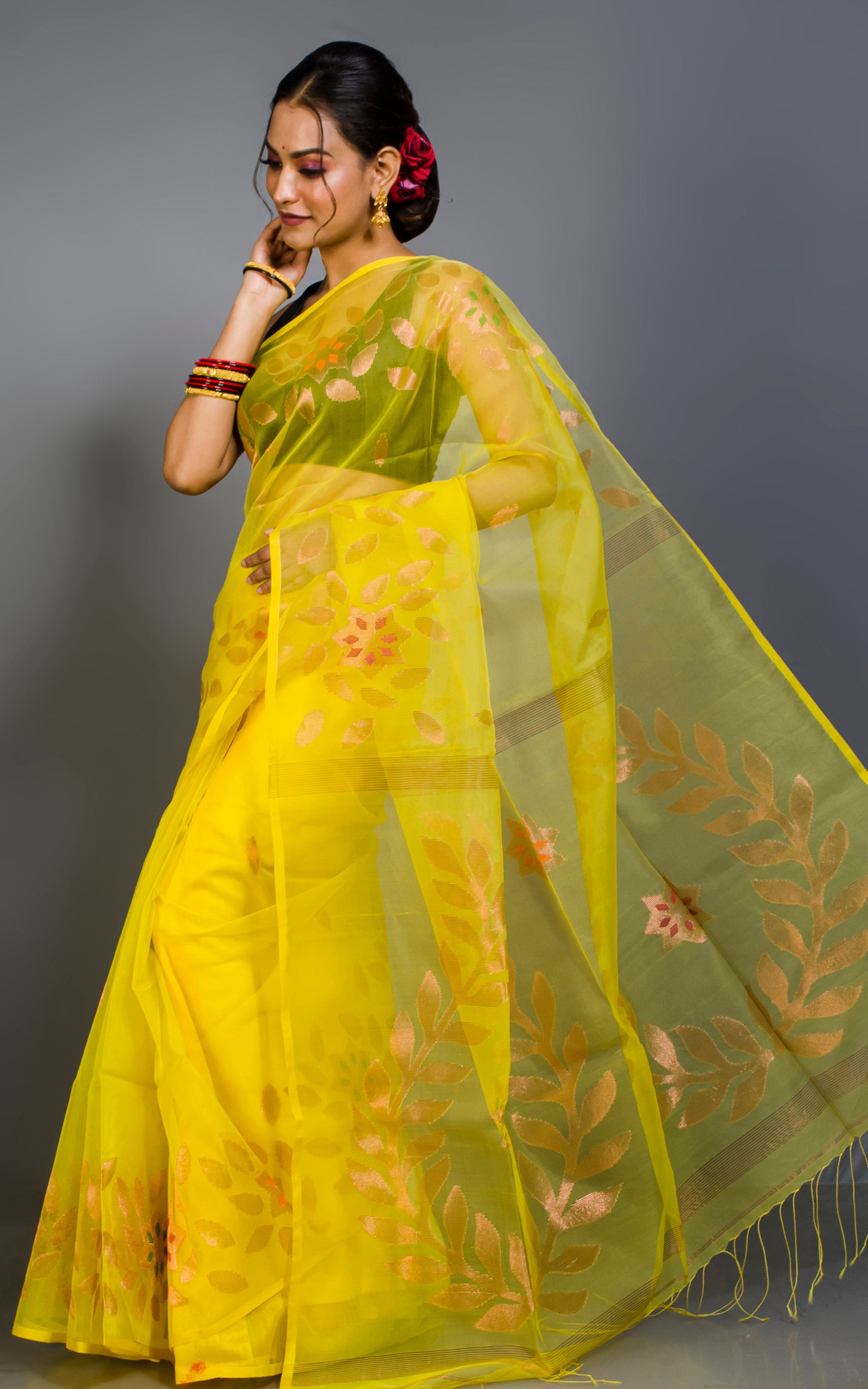 Soft Muslin Jamdani Saree in Cadmium Yellow, Copper and Multicolored Meenakari Work.