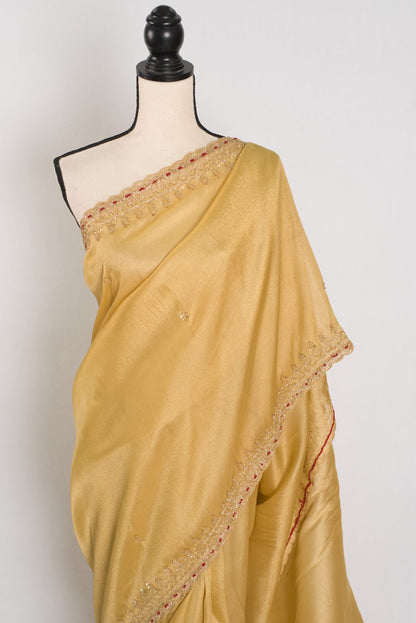 Nagma | Soft Tissue Gold Designer Saree with Hand Embroidery Border - Saree Mandi