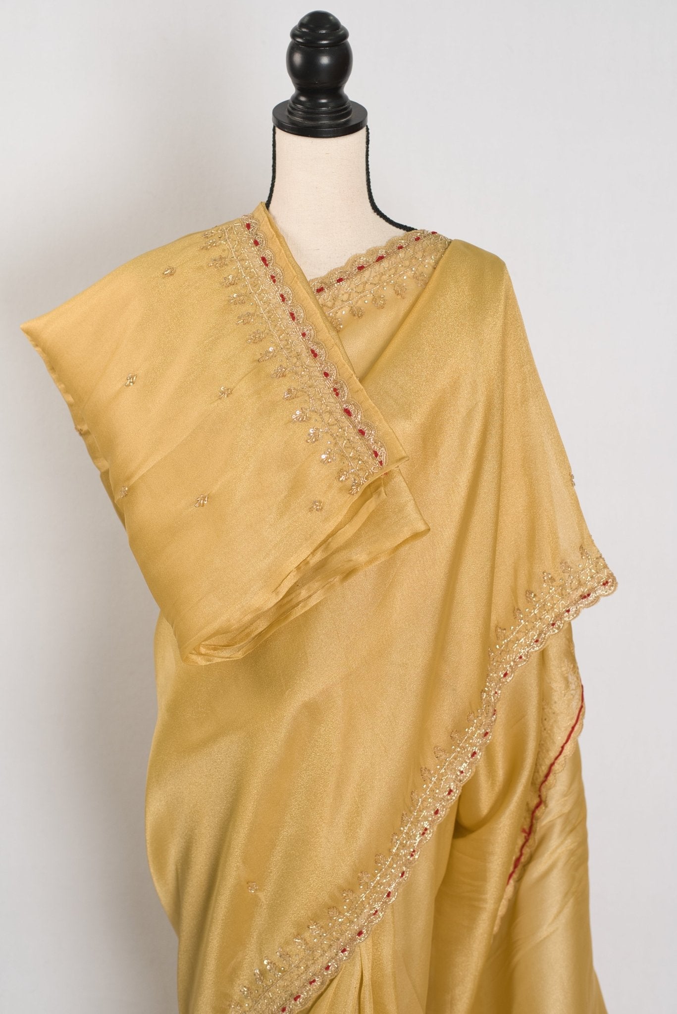 Nagma | Soft Tissue Gold Designer Saree with Hand Embroidery Border - Saree Mandi