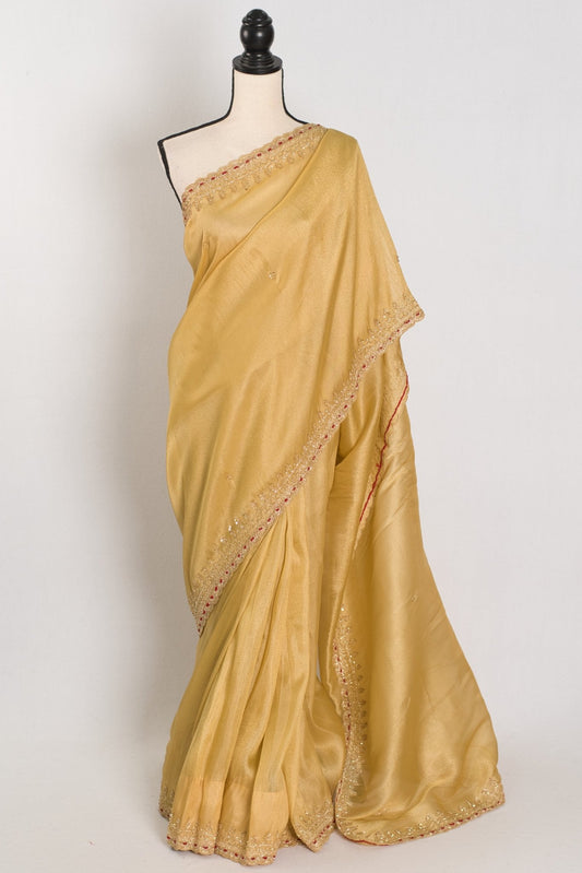 Nagma | Soft Tissue Gold Designer Saree with Hand Embroidery Border - Saree Mandi