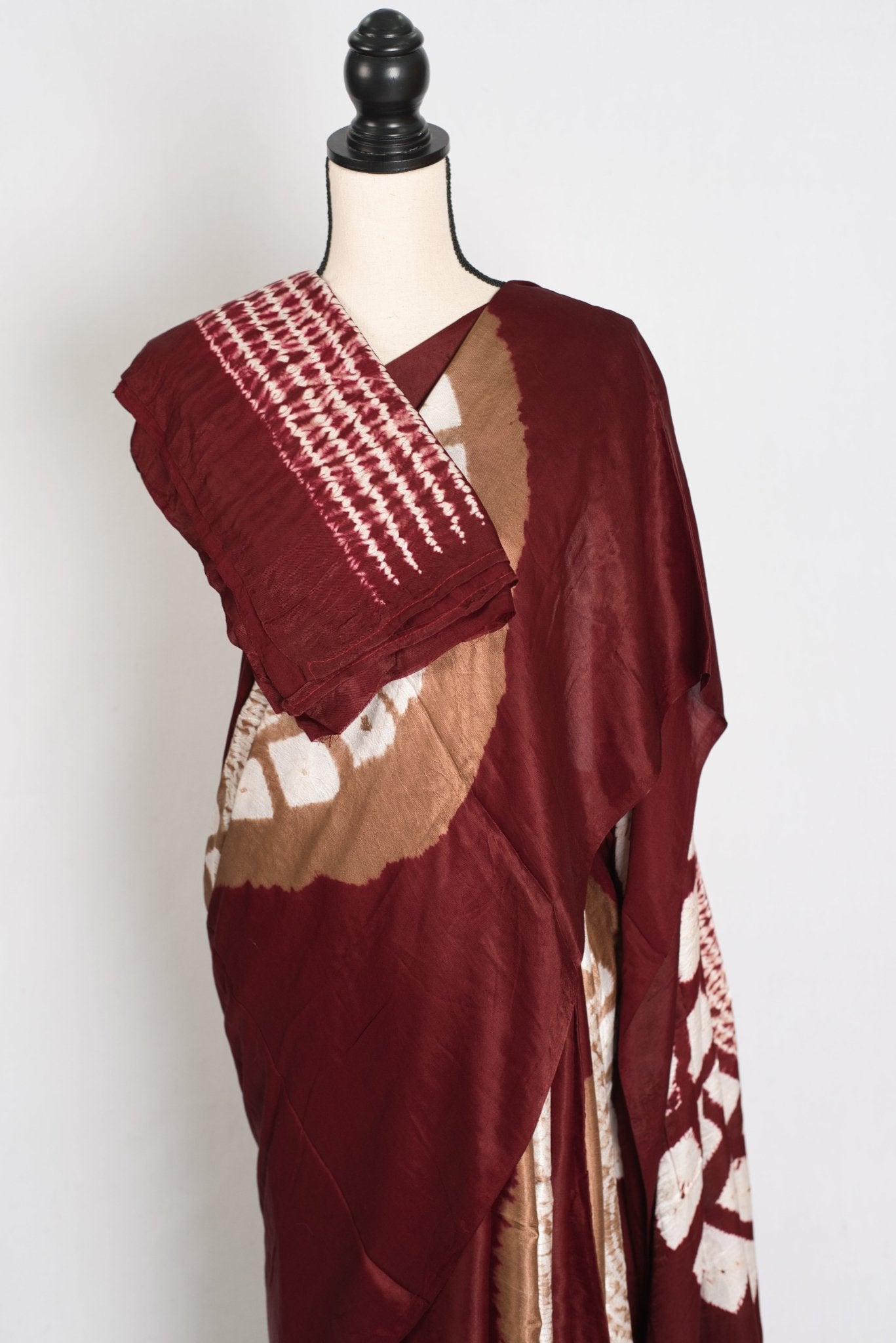 Nirja : Modal Silk Bandhani Partywear Saree in Maroon and Gold - Saree Mandi