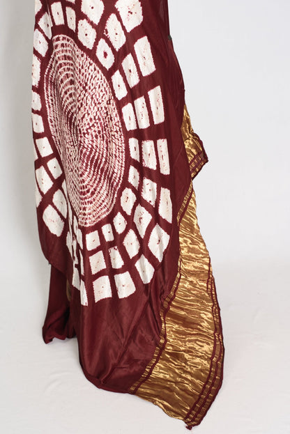 Nirja : Modal Silk Bandhani Partywear Saree in Maroon and Gold - Saree Mandi