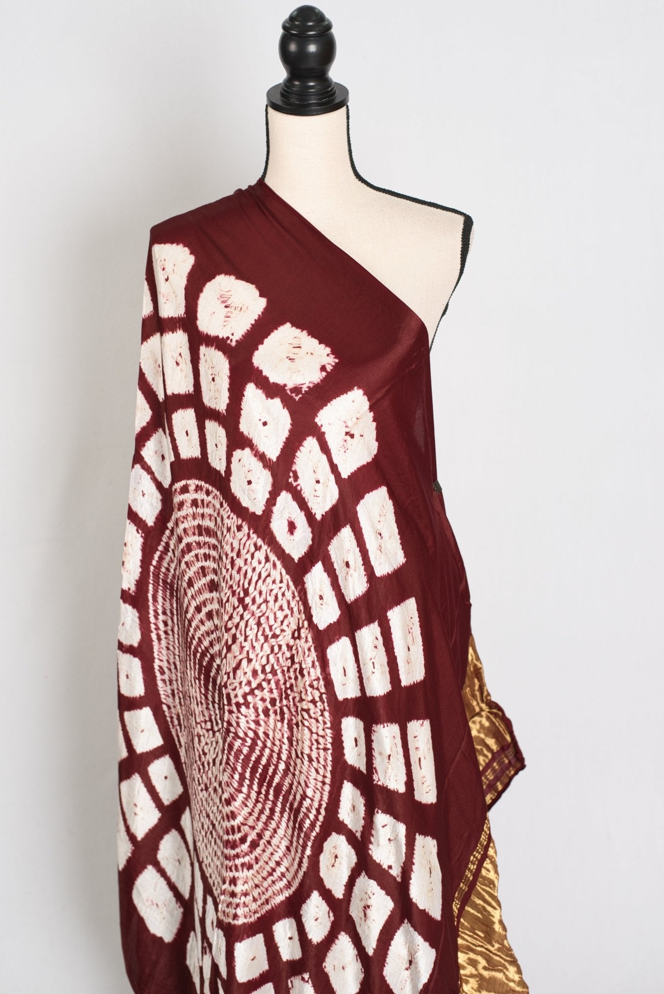 Nirja : Modal Silk Bandhani Partywear Saree in Maroon and Gold - Saree Mandi