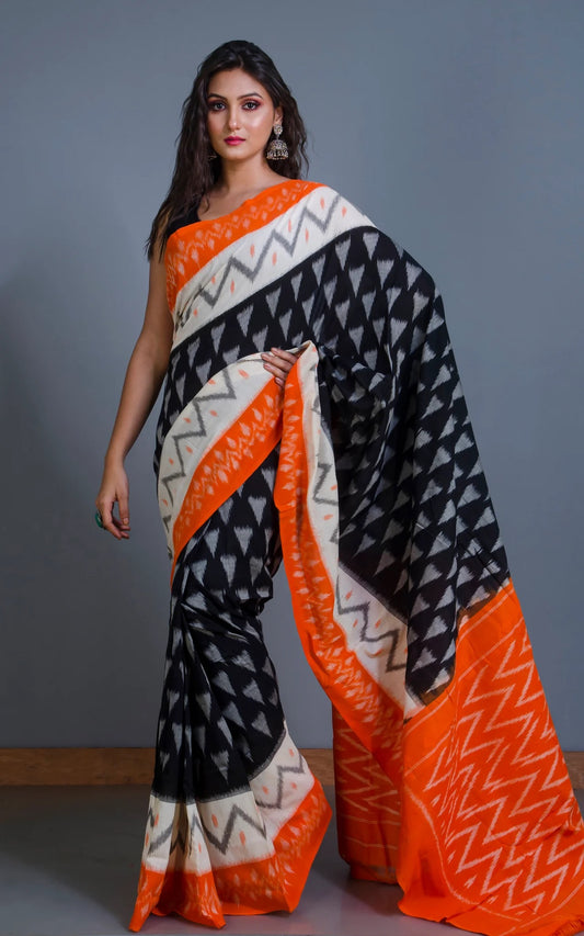 Soft Cotton Ikkat Pochampally Saree in Black and Orange.