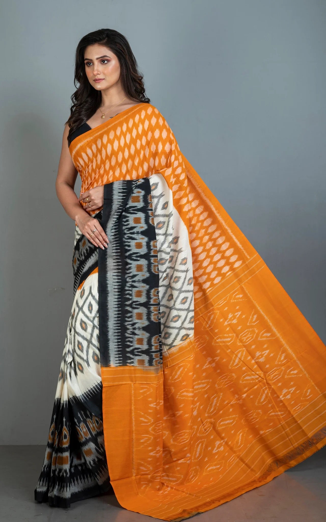 Mercerized Cotton Ikkat Pochampally Saree in Orange.