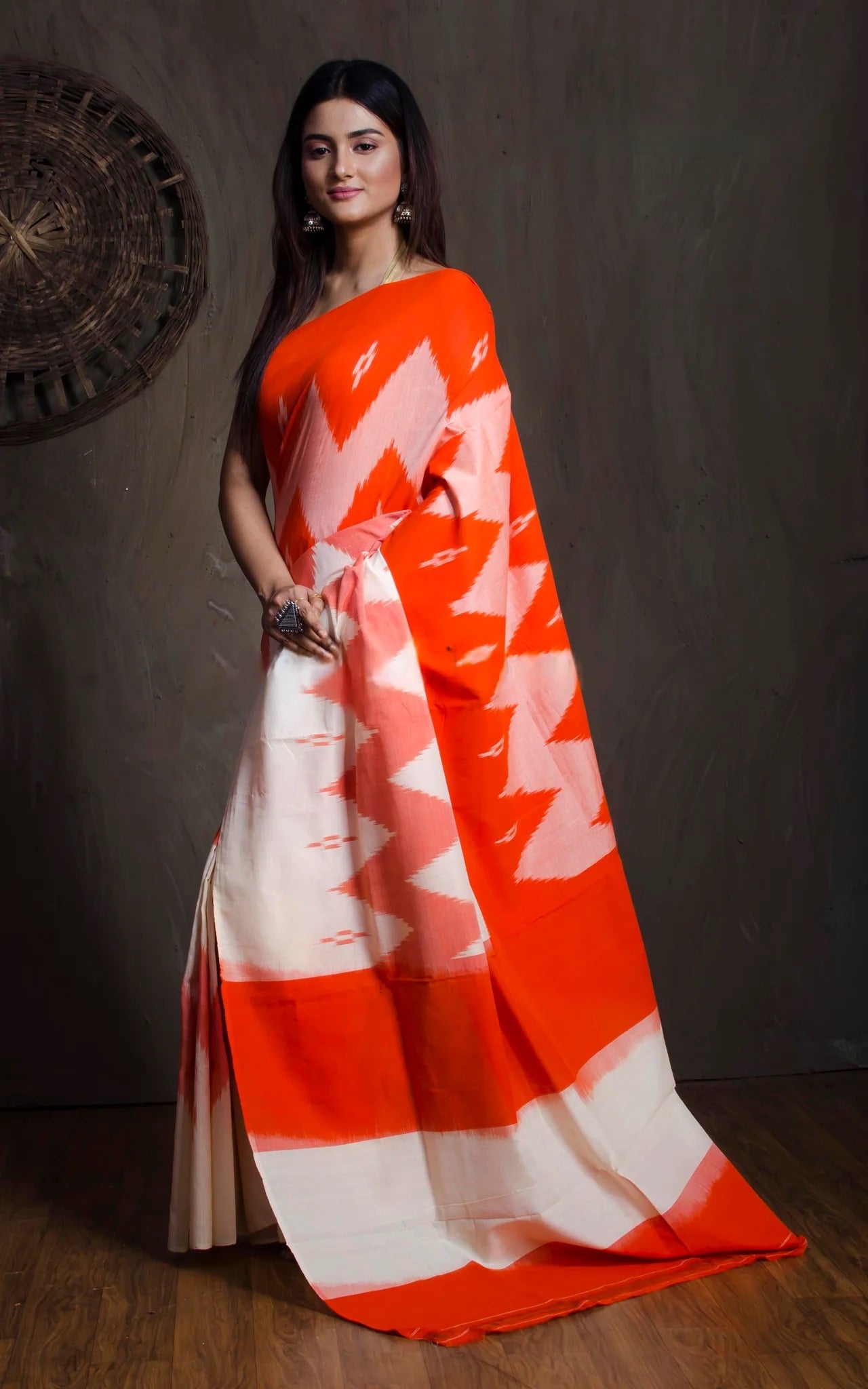Soft Cotton Ikkat Pochampally Saree in Off White and Orange.