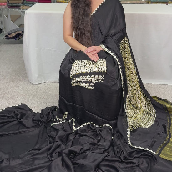 video of Farah : Modal Silk Bandhani Partywear Saree in Black and Gold - Saree Mandi