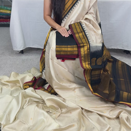 Video of Cream and black handwoven pure Gadwal silk saree.