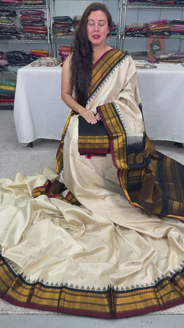 Video of Cream and black handwoven pure Gadwal silk saree.