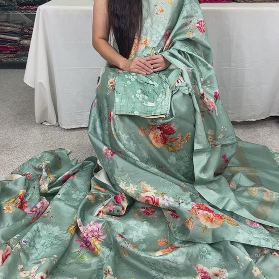 Video of Sea Green Floral Banarasi Katan Silk Saree with 40 Size Stitched Blouse.