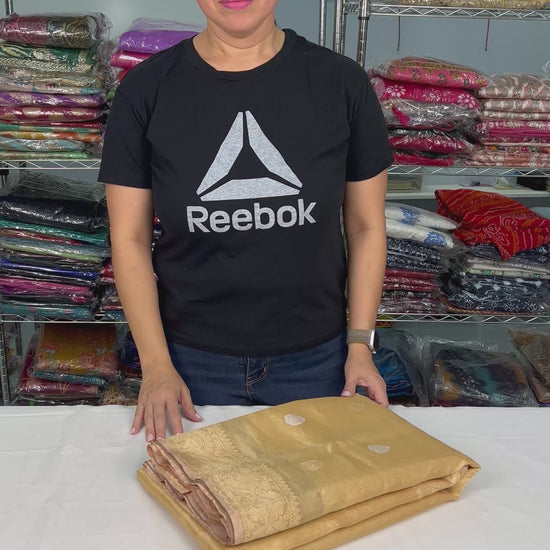 Video of Gold Kadwa Kora Tissue Silk Banarasi Saree with Silver and Golden Woven Zari