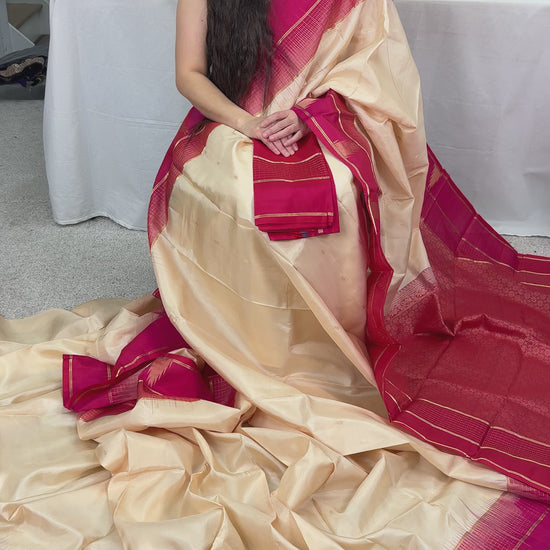 Video of Clay White & Rani Pink Kanjivaram Silk Saree | Silk Mark Certified.