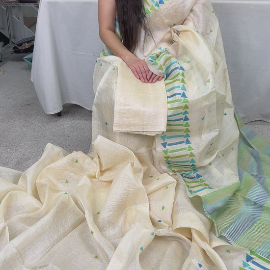 Video of Cream Tussar Silk Saree with Blue & Green Motifs | Silk Mark Certified.
