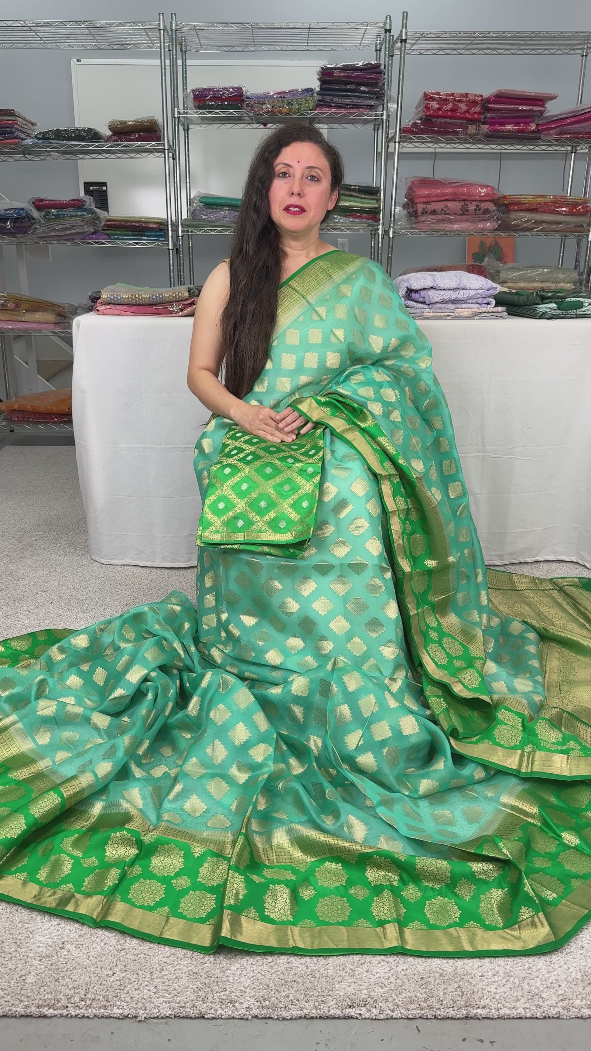 Video of Silk Mark Certified Kora Silk Banarasi Saree in Light Blue, Green and Gold.
