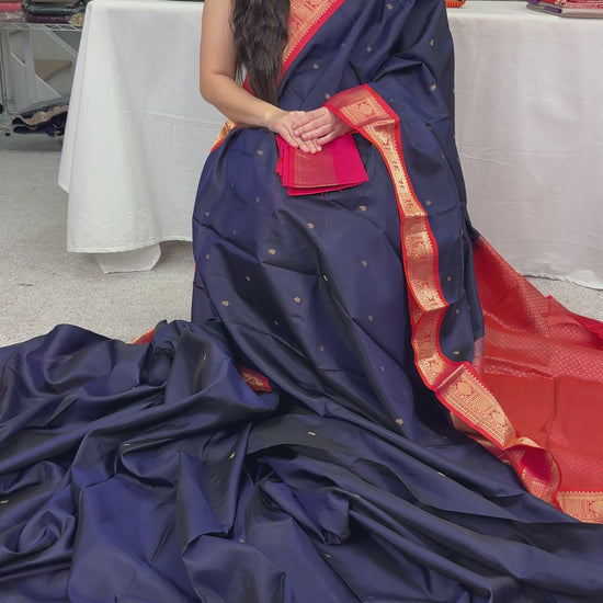 Video of Midnight Blue and Peach Traditional Kanjivaram Silk Saree.