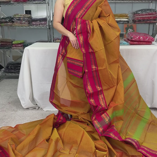 video of product Vrinda - Handwoven Kanchi Cotton Saree in Orangish Yellow with Rani Pink from Saree Mandi saree store.