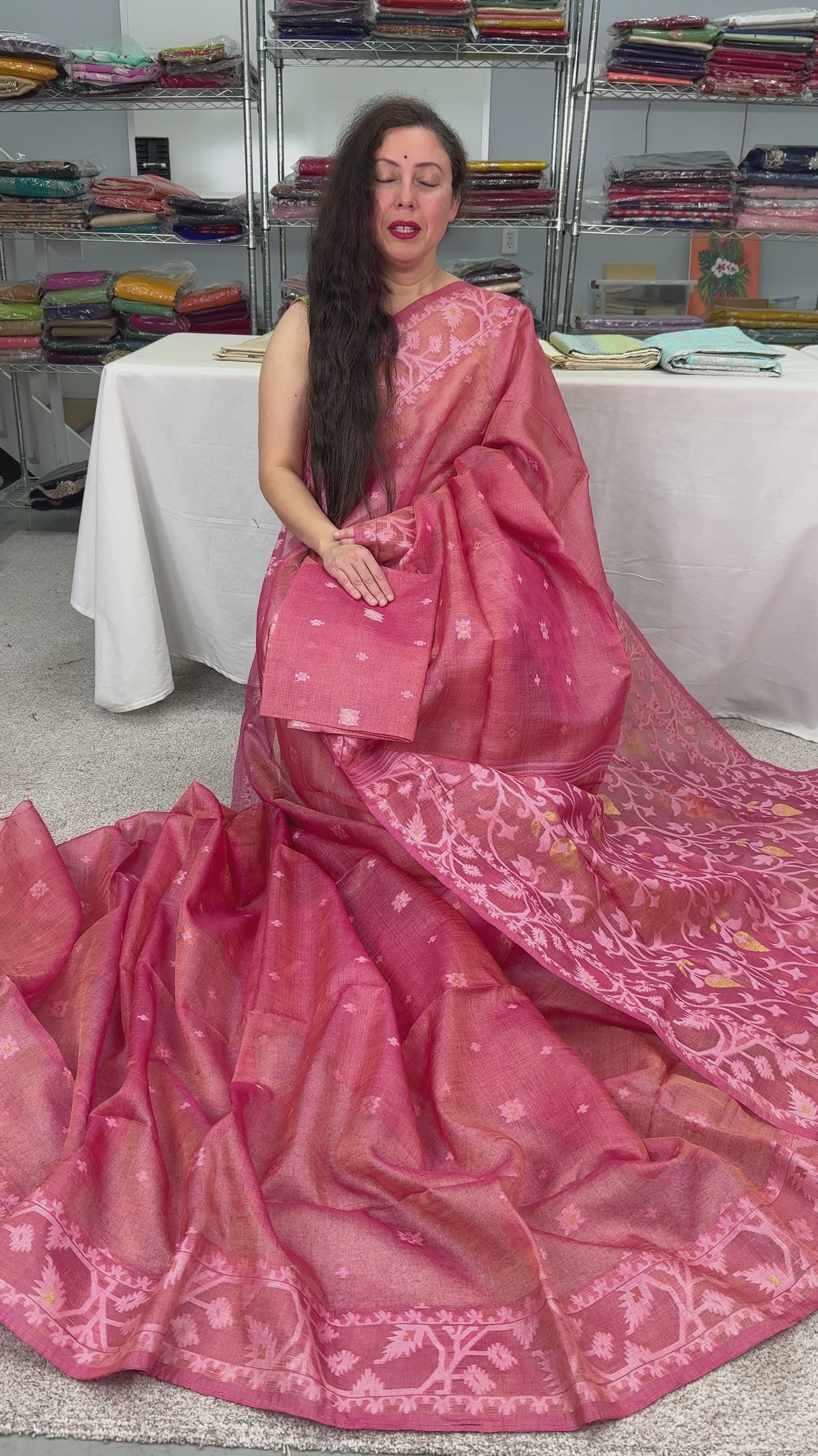 Video of Coral Pink Pure Bengal Tussar Silk Saree with Hand-Woven Jamdani Motif.