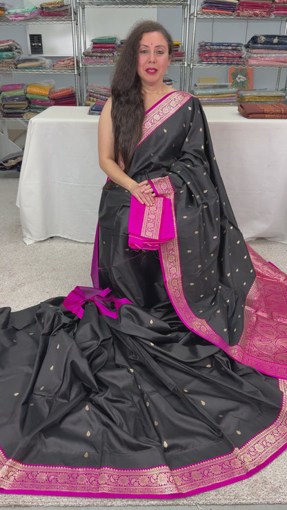 video of Silk Mark Certified Katan Banarasi Saree in Black and Magenta.