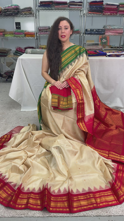 Video of Kavya : Ganga Jamuna Border Gadwal Silk Saree in Beige with Red and Green.
