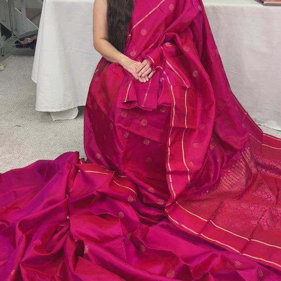Video of Rani Pink Handloom Kanjivaram Silk Saree with Traditional Peacock Motifs.
