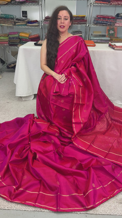 Video of Rani Pink Handloom Kanjivaram Silk Saree with Traditional Peacock Motifs.