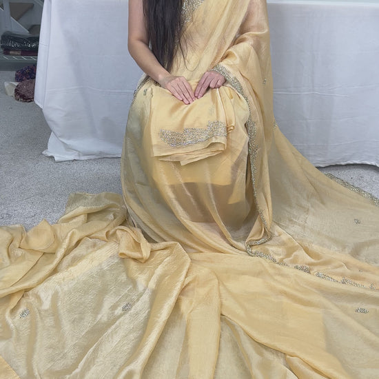 Video of Stone Embroidery Partywear Soft Crush Tissue Saree in Beige